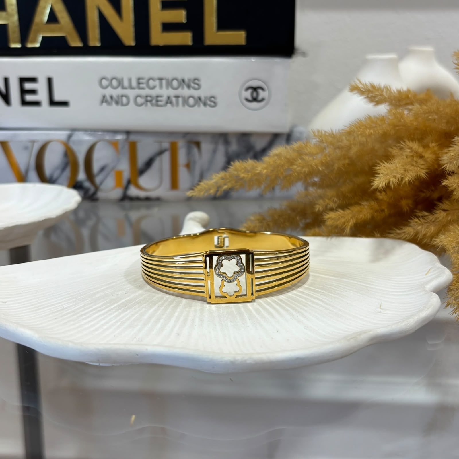 YILDIZ DETAYLI GOLD KELEPÇE